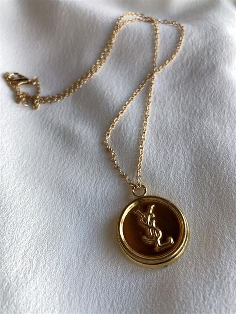 ysl leo necklace